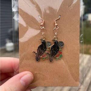 Hand-pieced Black Bird Earrings with Red Floral Accents